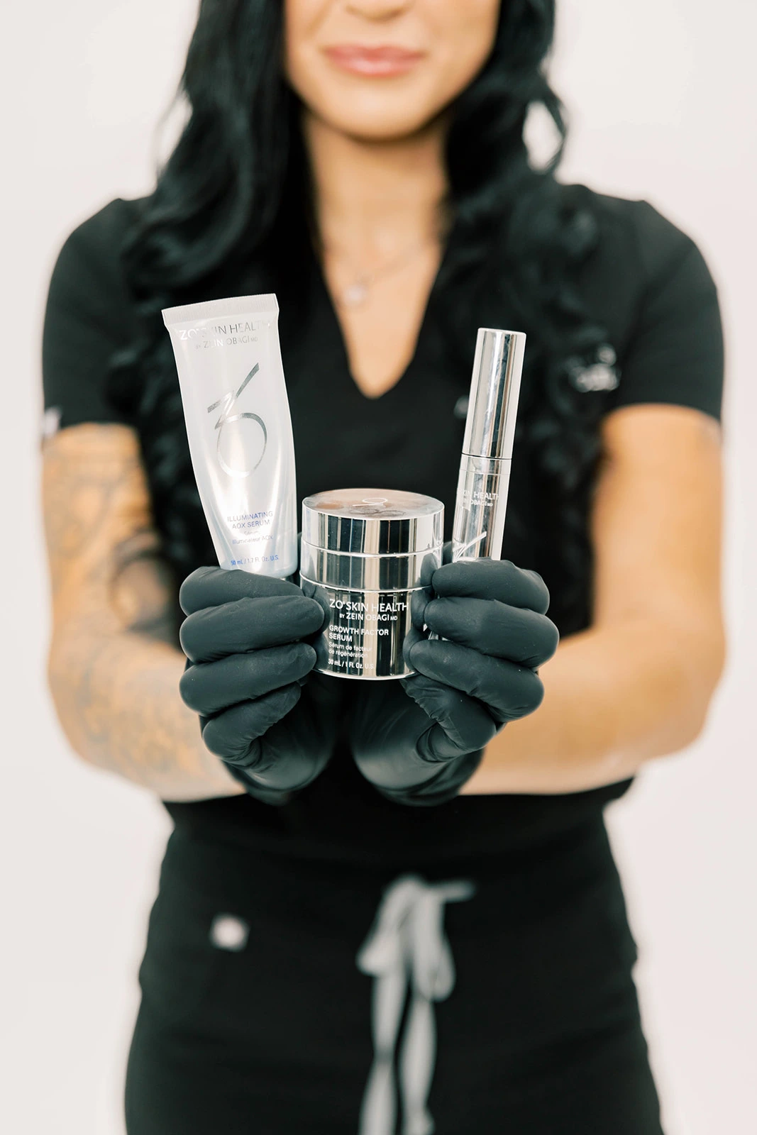 Photo of team member holding products